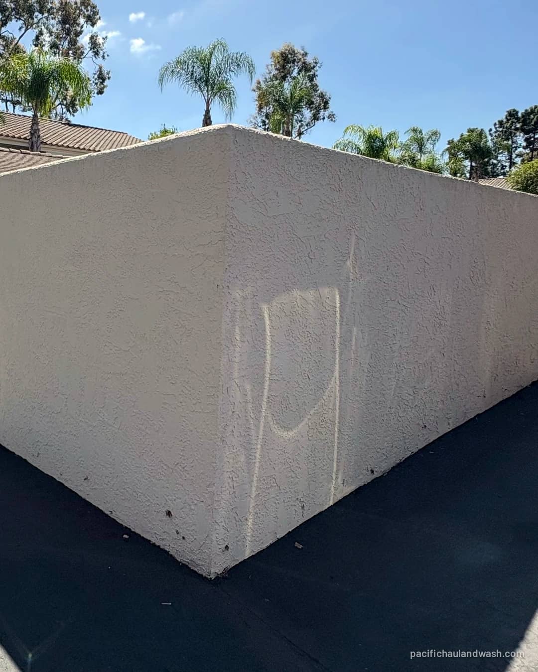 Same wall by the street after PHW picked up the mattress and hauled it off